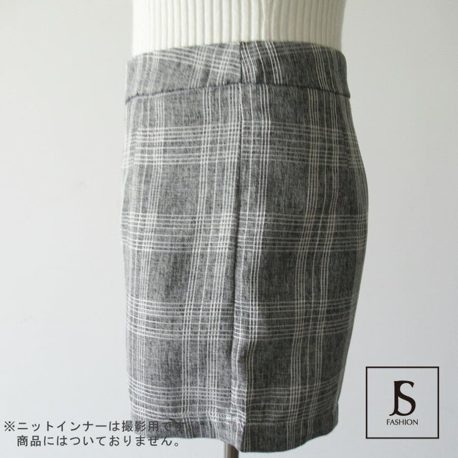 セットアップ チェック柄テーラードジャケットとショートパンツ