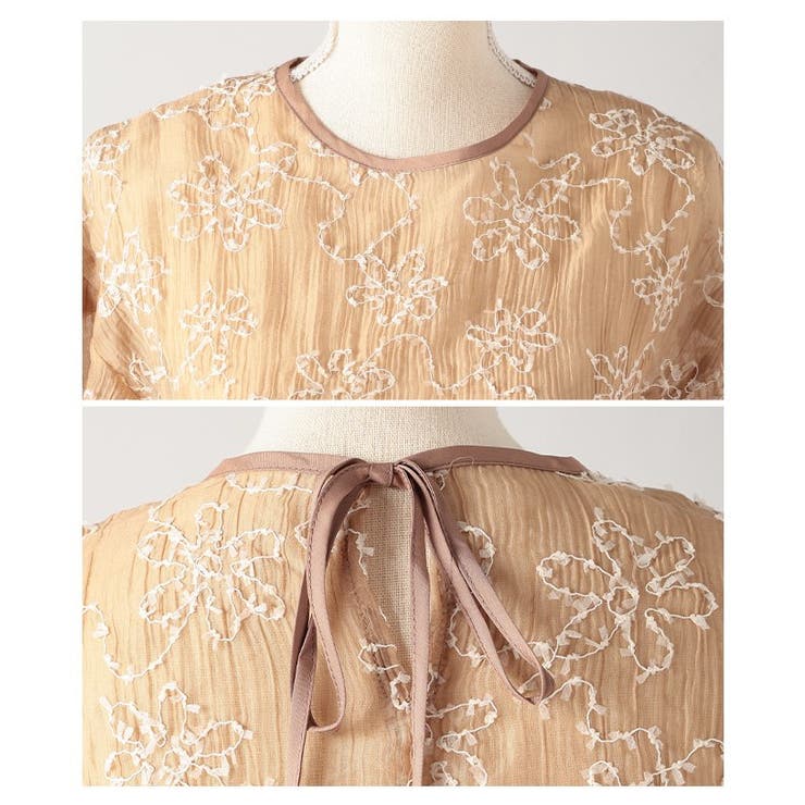 可憐な抜け感纏うフリンジ風花柄刺繍パフスリーブペプラムシアー