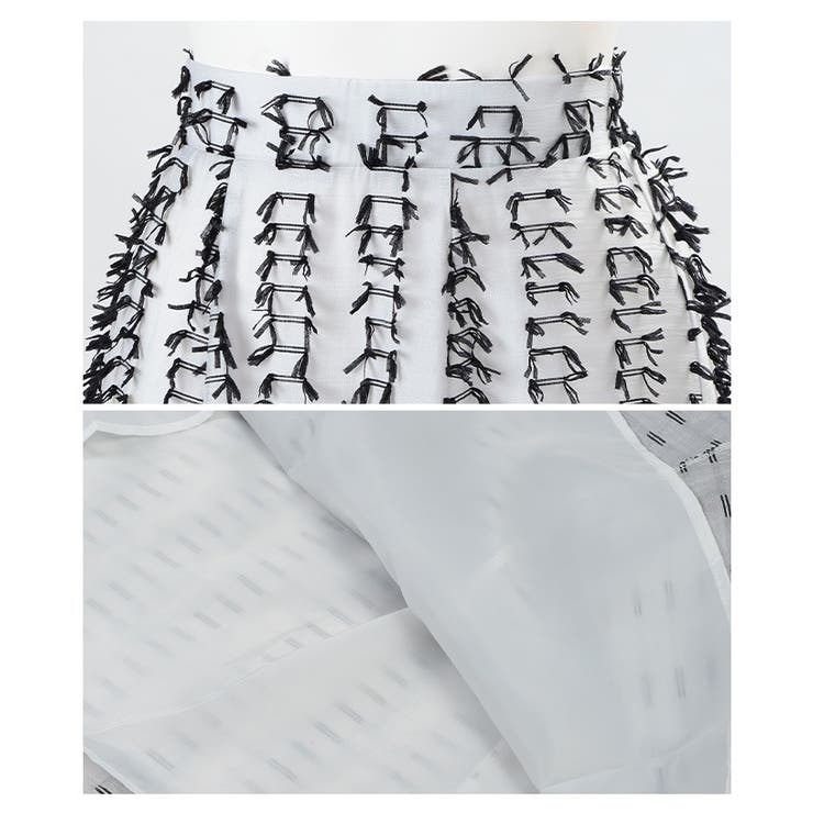 モードに揺らめくフリンジデザインシアーフレアスカート レディース