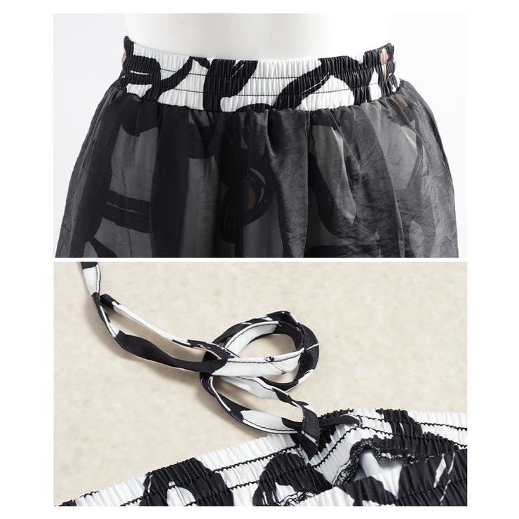 モードな遊び心を纏うペイント柄チュールレイヤードワイドパンツ