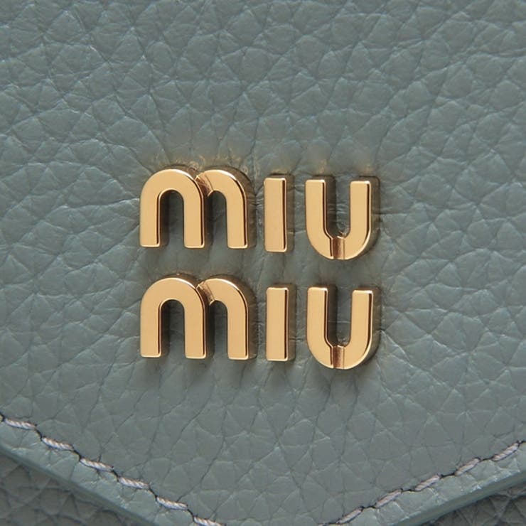ミュウミュウ二つ折り財布メタルロゴフラップ付きブルーレディースMIUMIU5MH040ADT7F0035
