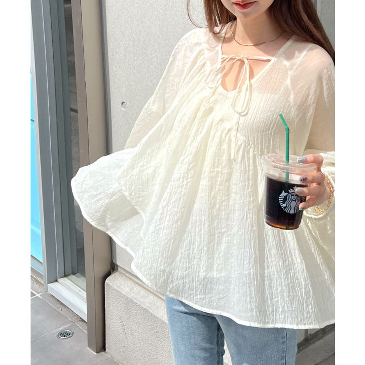 アイボリー | フェミニンもカジュアルも自在に。前後2Wayフリルトップス | futier land
