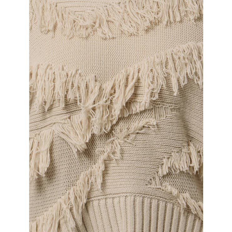 Chloeウールクロシェトリムファネルネックニット ランダムフリンジ