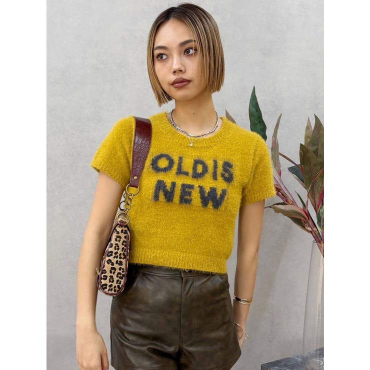 マスタード | ジャガードロゴシャギーニットトップス | EVRIS