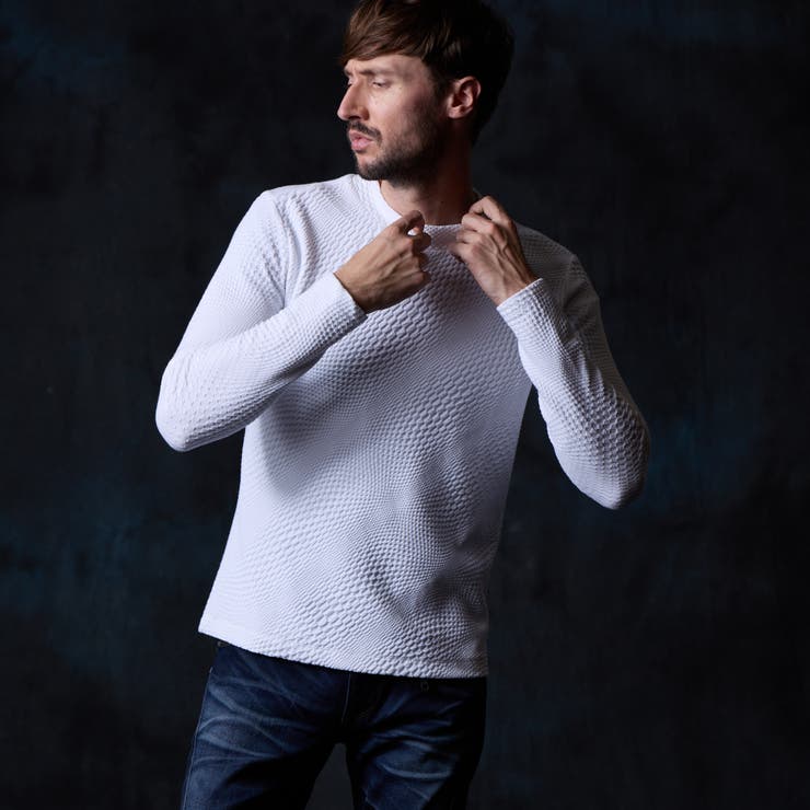 09ホワイト | バイヤスジオメトリックモックネックプルオーバー | NICOLE