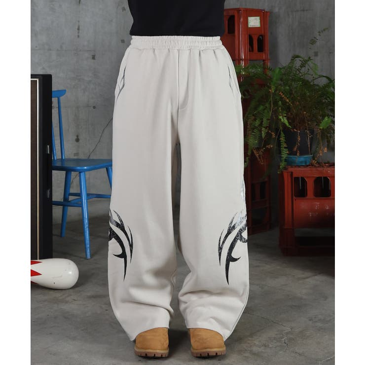 アイボリー | ILL S(イルズ)メタルプリント トライバルワイドスウェットパンツ | SHIFFON 