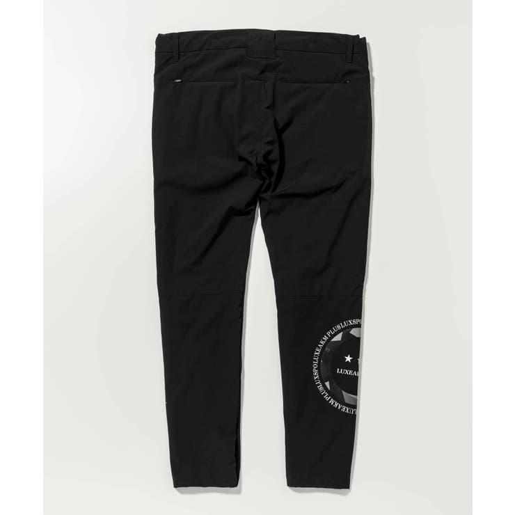 LUXEAKMPLUS リュクスエイケイエムプラス サークルロゴウィンドパンツ