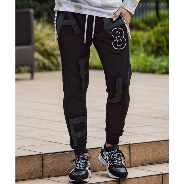 ブラック | 1PIU1UGUALE3 RELAX ビッグファスナーランダムロゴジョガーパンツ | SHIFFON 