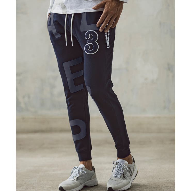 ネイビー | 1PIU1UGUALE3 RELAX ビッグファスナーランダムロゴジョガーパンツ | SHIFFON 