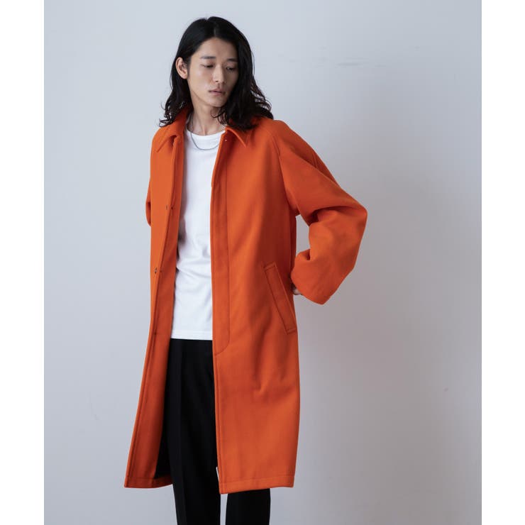 オレンジ色のコート - アウター