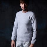 09ホワイト | 幾何学風バイヤス柄クルーネックニット | NICOLE