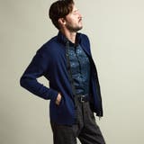 67ネイビー | プレーティングリブジャカードニットジップブルゾン | NICOLE