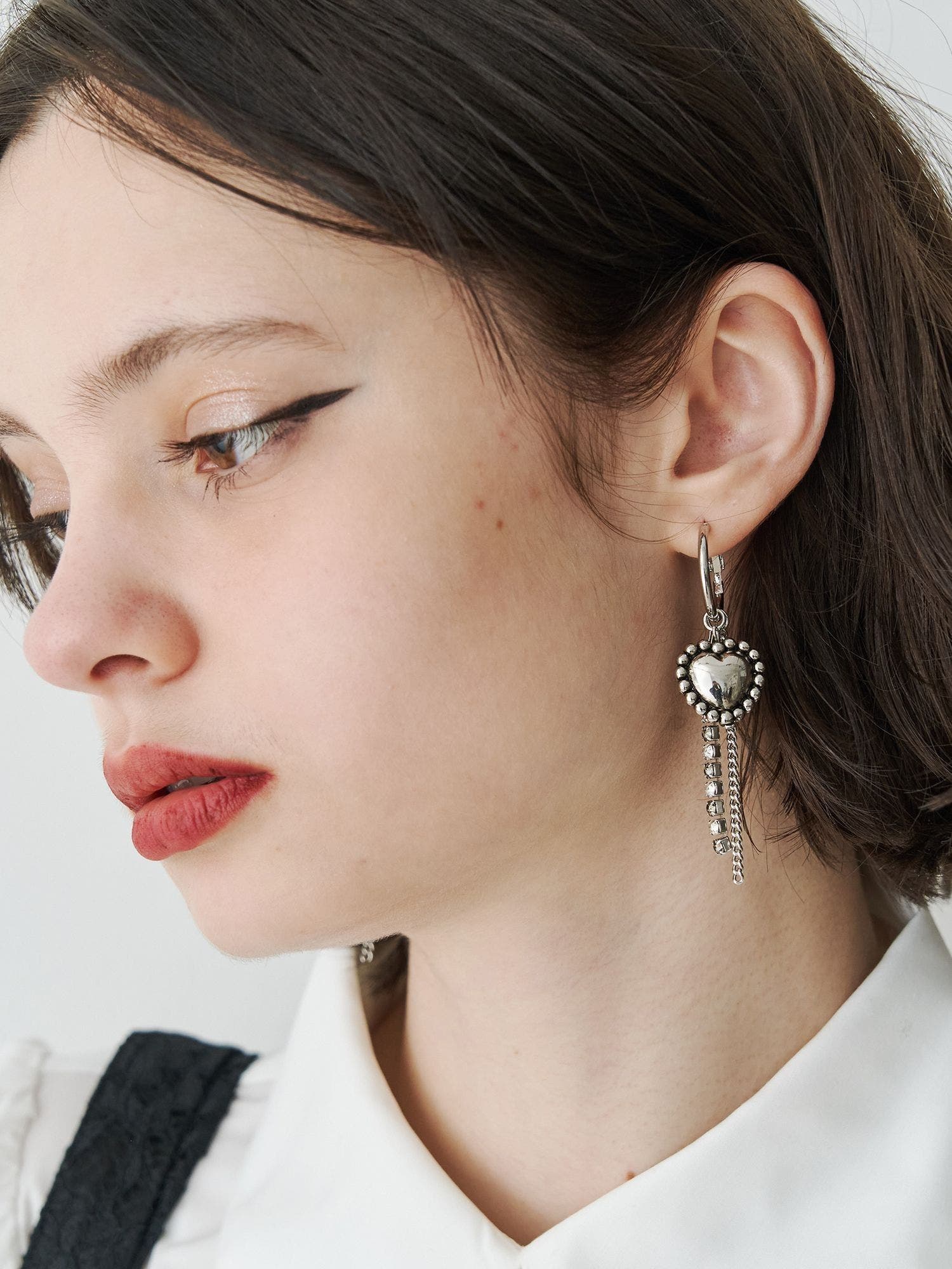 Cornu のビジューピンクピアス ビジュー フェザー ピアス pink | EVOKE TRILL