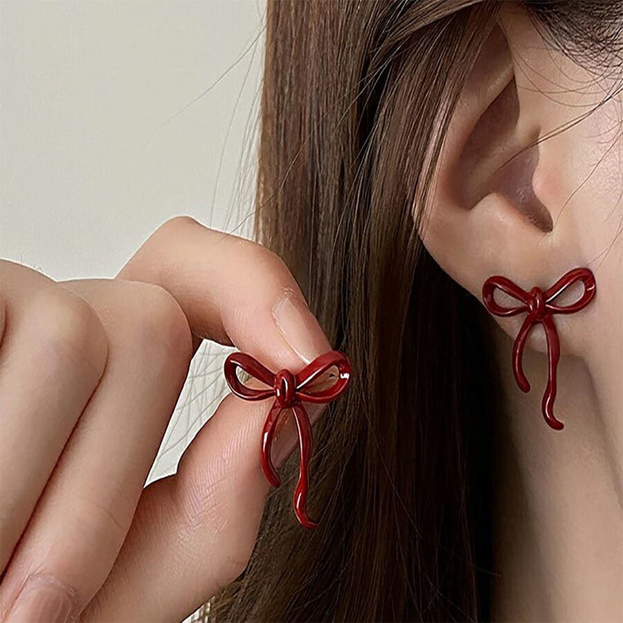 リボン型シルバーピアス ストーン付き セール】合金リボン型ピアス（ピアス（両耳用））｜LA VORAGINE