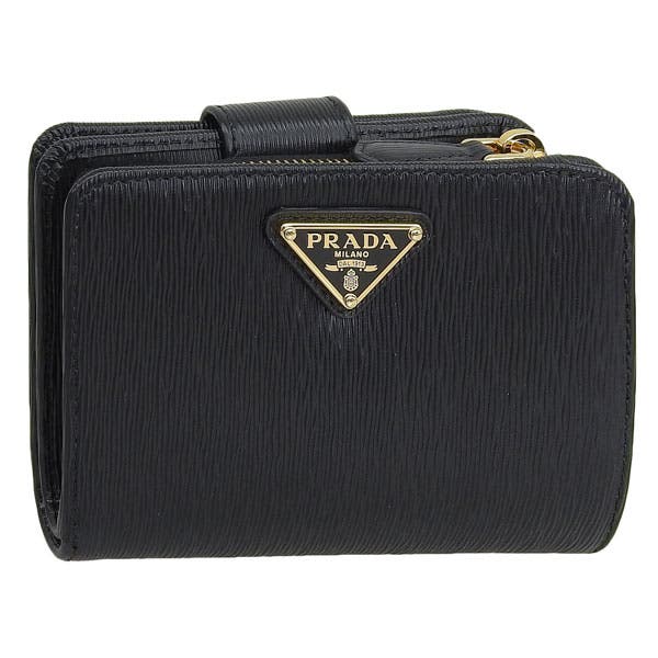 最終価格　PRADA プラダ　レザービスチェ　ノースリーブ　レイヤード PRADA プラダレザービスチェノースリーブレイヤードレザータグ